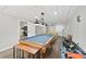 Basement featuring a pool table and foosball table, perfect for entertaining guests and Gathering fun at 1450 Chadberry Way, Lawrenceville, GA 30043