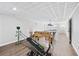 Basement featuring a foosball table, pool table, and exercise equipment for recreational activities at 1450 Chadberry Way, Lawrenceville, GA 30043