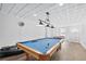 Basement featuring a pool table and foosball table, creating a fun and recreational space for all at 1450 Chadberry Way, Lawrenceville, GA 30043