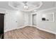 Bedroom featuring hardwood floors, a modern ceiling fan, and recessed lighting with multiple closets at 1450 Chadberry Way, Lawrenceville, GA 30043