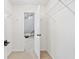 Walk in closet with wire shelving and a view to the bedroom at 1450 Chadberry Way, Lawrenceville, GA 30043
