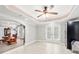 Bright open kitchenette with wine storage, french doors, and luxury seating at 1450 Chadberry Way, Lawrenceville, GA 30043