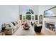 Bright living room with large windows, fireplace, and hardwood flooring at 1450 Chadberry Way, Lawrenceville, GA 30043