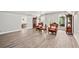 Spacious living room with pool table access, luxury chairs and curated furniture at 1450 Chadberry Way, Lawrenceville, GA 30043