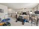 Bonus room with a ceiling fan, neutral walls, workout equipment, and casual seating at 207 Magnolia Creek Way, Woodstock, GA 30188