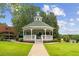 Charming community gazebo with manicured lawn and landscaping at 207 Magnolia Creek Way, Woodstock, GA 30188