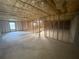 Unfinished basement with exposed beams, framing, and insulation, ready for customization and build-out at 392 Beranda Cir, Douglasville, GA 30134