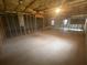 Unfinished basement featuring insulated ceiling and framed walls, ready for future customization at 392 Beranda Cir, Douglasville, GA 30134