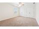 Bedroom featuring carpeted floors, neutral walls, and double closets, ideal for storage at 392 Beranda Cir, Douglasville, GA 30134