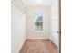 Walk-in closet with wire shelving and carpeted floor, providing efficient storage and organization at 392 Beranda Cir, Douglasville, GA 30134