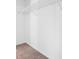 Walk-in closet with white walls, neutral carpet and wire shelving for maximized storage space at 392 Beranda Cir, Douglasville, GA 30134