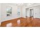 Dining room featuring hardwood floors, natural light from windows and white walls at 392 Beranda Cir, Douglasville, GA 30134
