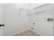 This is a laundry room with tile flooring and includes utility connections for efficient laundry setup at 392 Beranda Cir, Douglasville, GA 30134