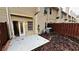 Private patio area with a fenced yard, perfect for outdoor entertaining and relaxation at 4134 Rogers Creek Ct # 41, Duluth, GA 30096