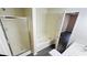 Modern bathroom equipped with glass enclosed shower, soaking tub, and contemporary fixtures, offering a spa-like experience at 4134 Rogers Creek Ct # 41, Duluth, GA 30096