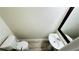 Angle view of a bathroom featuring a pedestal sink, framed mirror and toilet in a well-lit space at 4134 Rogers Creek Ct # 41, Duluth, GA 30096