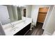 Bathroom featuring double sink vanity, tile flooring, bathtub, shower, and view into walk-in closet at 4134 Rogers Creek Ct # 41, Duluth, GA 30096