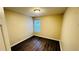 Bedroom featuring new wood floors and ample natural light from window at 4134 Rogers Creek Ct # 41, Duluth, GA 30096