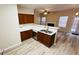 Modern kitchen features stainless steel appliances, white countertops, and wooden cabinets at 4134 Rogers Creek Ct # 41, Duluth, GA 30096