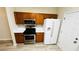 Well-equipped kitchen featuring stainless steel appliances, wooden cabinets, and white countertops at 4134 Rogers Creek Ct # 41, Duluth, GA 30096