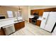 Well-equipped kitchen featuring stainless steel appliances, wooden cabinets, and white countertops at 4134 Rogers Creek Ct # 41, Duluth, GA 30096
