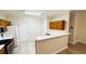 Bright kitchen featuring stainless steel appliances, wooden cabinets, and ample counter space at 4134 Rogers Creek Ct # 41, Duluth, GA 30096
