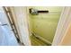 A look into the laundry closet, complete with washer and dryer hookups, plus shelving for organizing cleaning supplies at 4134 Rogers Creek Ct # 41, Duluth, GA 30096