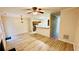 Spacious living room boasts wood flooring, a ceiling fan, and an open layout, perfect for entertaining at 4134 Rogers Creek Ct # 41, Duluth, GA 30096