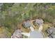 Aerial view of stunning homes on a cul-de-sac, featuring well-maintained lawns and lush greenery at 55 Hazelbrook Way, Acworth, GA 30101