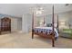 Spacious bedroom features a four poster bed, carpet, and unique furniture at 55 Hazelbrook Way, Acworth, GA 30101