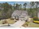 Beautiful home with mature landscaping, attached two-car garage, and a welcoming front entrance at 55 Hazelbrook Way, Acworth, GA 30101