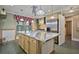 Spacious kitchen with a stainless steel island, pendants, and stainless steel appliances at 55 Hazelbrook Way, Acworth, GA 30101