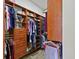 Large walk-in closet with custom shelving and ample storage space at 55 Hazelbrook Way, Acworth, GA 30101
