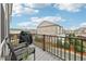 A cozy balcony provides a spot to unwind outdoors, featuring chairs and views of the neighborhood at 115 Harlow Cir, Roswell, GA 30076
