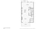 Floor plan featuring an open living and kitchen space, with a small back patio at 115 Harlow Cir, Roswell, GA 30076