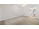 Spacious bedroom with a ceiling fan and an attached bathroom with a vanity area at 1606 Vicksburg Pl, Atlanta, GA 30350