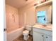 Standard bathroom with tub/shower combo, toilet, and vanity at 290 Brookview Dr, Riverdale, GA 30274