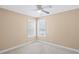 Bedroom with neutral walls and carpet with two windows at 453 Clematis Ct, Temple, GA 30179