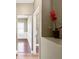 Hallway with hardwood floors and decorative flower pot at 453 Clematis Ct, Temple, GA 30179