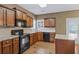 Kitchen with stainless appliances and island at 453 Clematis Ct, Temple, GA 30179