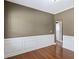 Living room with warm neutral colors and wood floors at 453 Clematis Ct, Temple, GA 30179