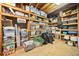 Basement storage room with shelving providing ample storage space at 6695 Woodstock Rd, Acworth, GA 30102