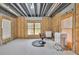 Bright unfinished basement featuring multiple windows, offering potential for customization and natural light at 2323 Council Ln, Buford, GA 30519