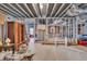 Spacious unfinished basement with open ceiling, concrete floor, and partially framed walls, ready for customization at 2323 Council Ln, Buford, GA 30519