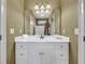 Cozy bathroom featuring a marble countertop vanity with abundant drawers and cabinet space at 2323 Council Ln, Buford, GA 30519