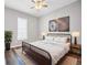 Cozy bedroom with modern decor, hardwood floors, and ample natural light at 510 James P. Brawley Dr. Nw Dr, Atlanta, GA 30318