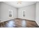 Bright bedroom with hardwood floors and two windows at 510 James P. Brawley Dr. Nw Dr, Atlanta, GA 30318