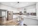 Modern kitchen with white cabinets, granite countertops, and stainless steel appliances at 510 James P. Brawley Dr. Nw Dr, Atlanta, GA 30318