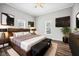 Comfortable bedroom with hardwood floors, ceiling fan, and ample natural light at 510 James P. Brawley Dr. Nw Dr, Atlanta, GA 30318
