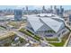 Aerial view showcasing Mercedes Benz Stadium, a modern sports and entertainment venue in the heart of downtown Atlanta at 510 James P. Brawley Dr. Nw Dr, Atlanta, GA 30318